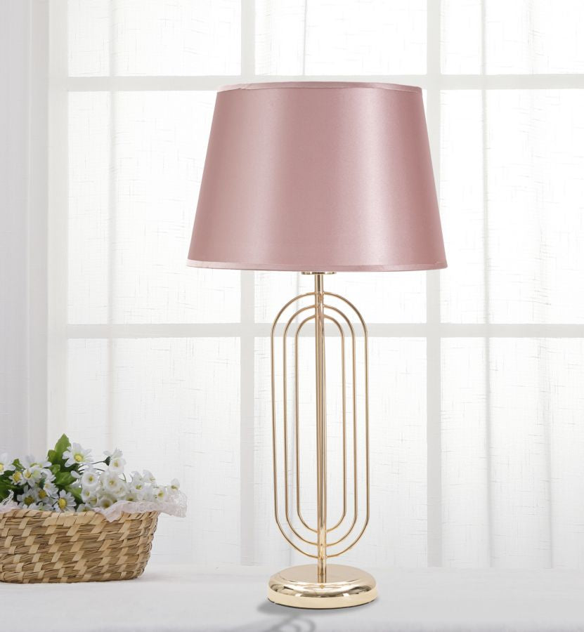 Lampada Krista da tavolo in metallo dorata con paralume rosa