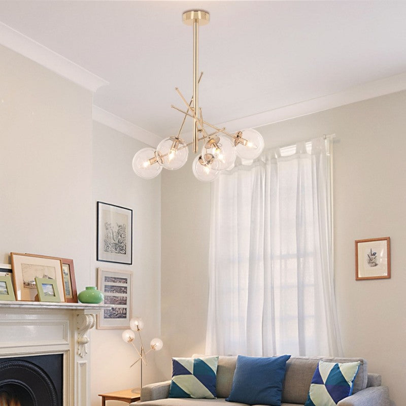 Lampada da soffitto in metallo colore oro con 5 paralumi in vetro