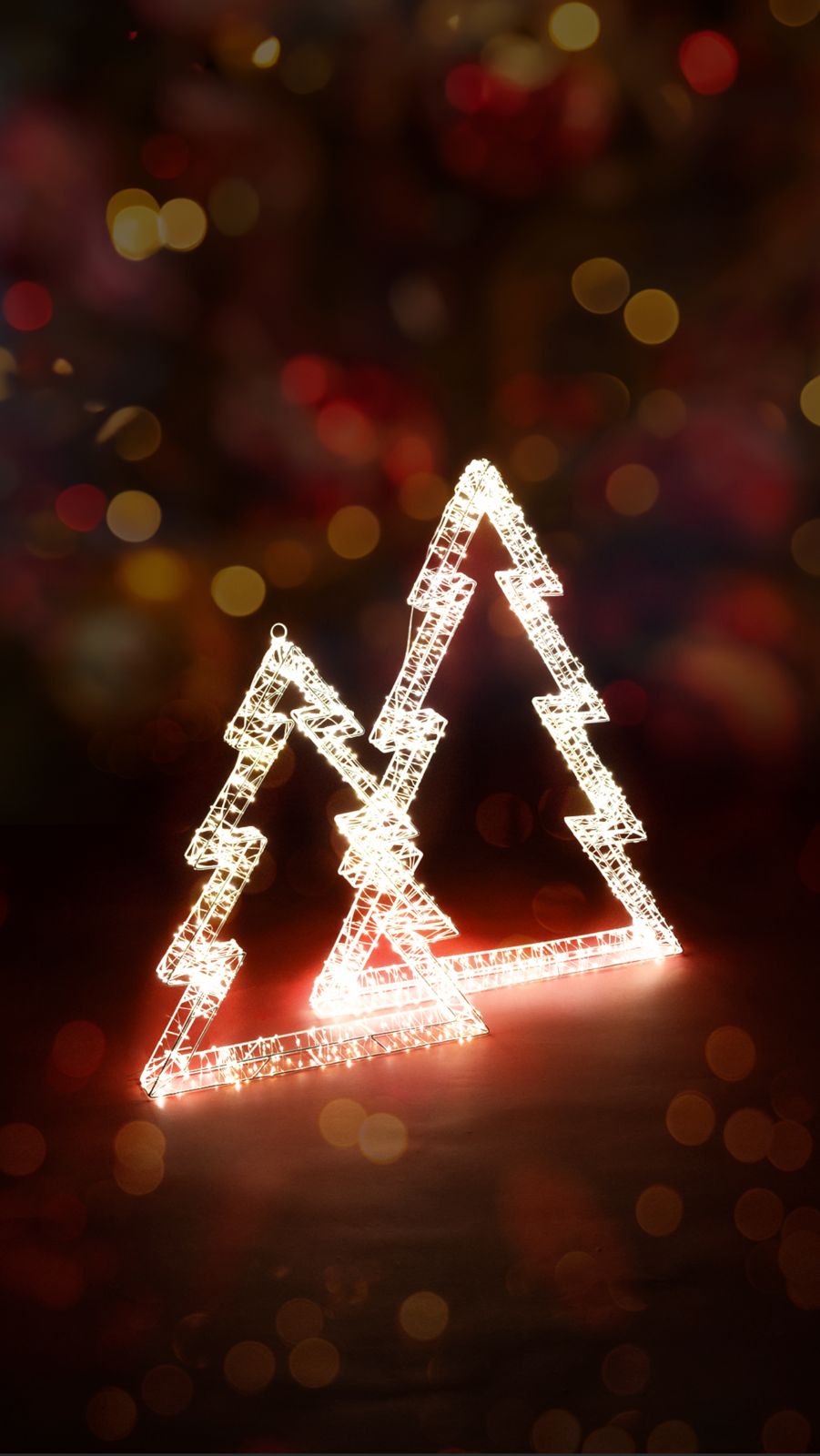 Albero Luminoso 3D con Led Bianco Caldo e Led Flash disponibile in 2 diverse dimensioni, pensato per poter essere appeso, ma spesso utilizzato anche d'appoggio