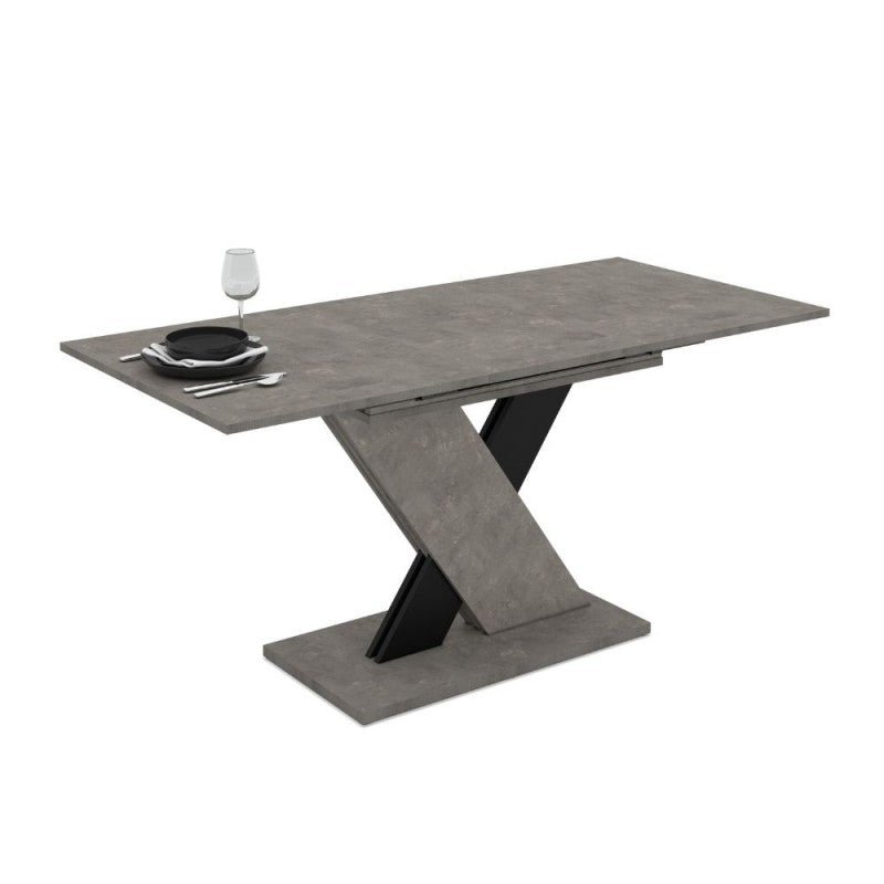 Tavolo allungabile Axi in cemento con dettaglio nero