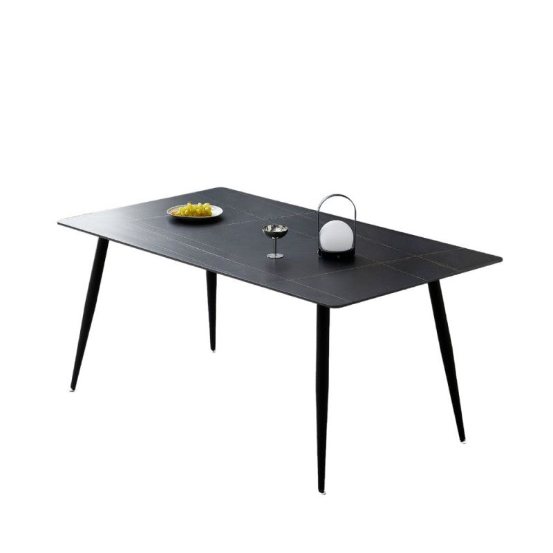 Tavolo 140x80 con top in ceramica effetto marmo grigio opaco e gambe in metallo nero.